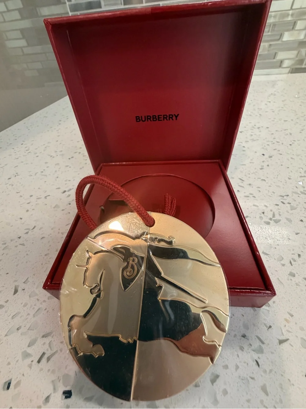 Burberry Gold Round Equestrian Holiday Ornament with Red Cord